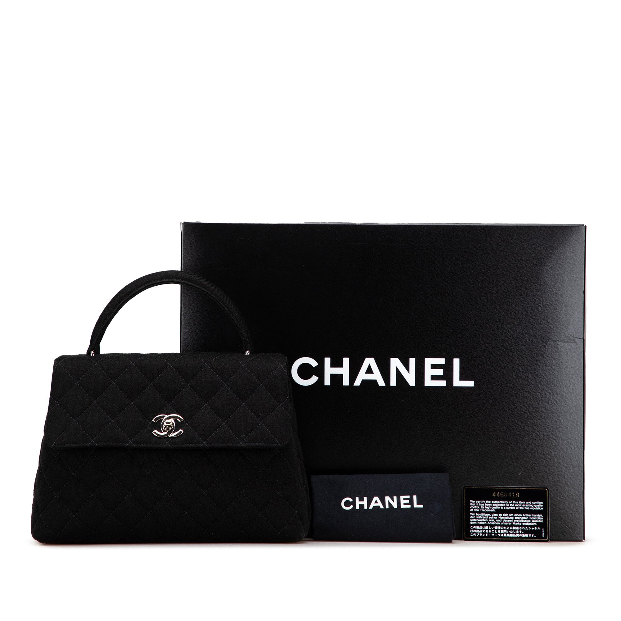 Chanel CC Quilted Jersey Kelly Top Handle Bag - The Boutique