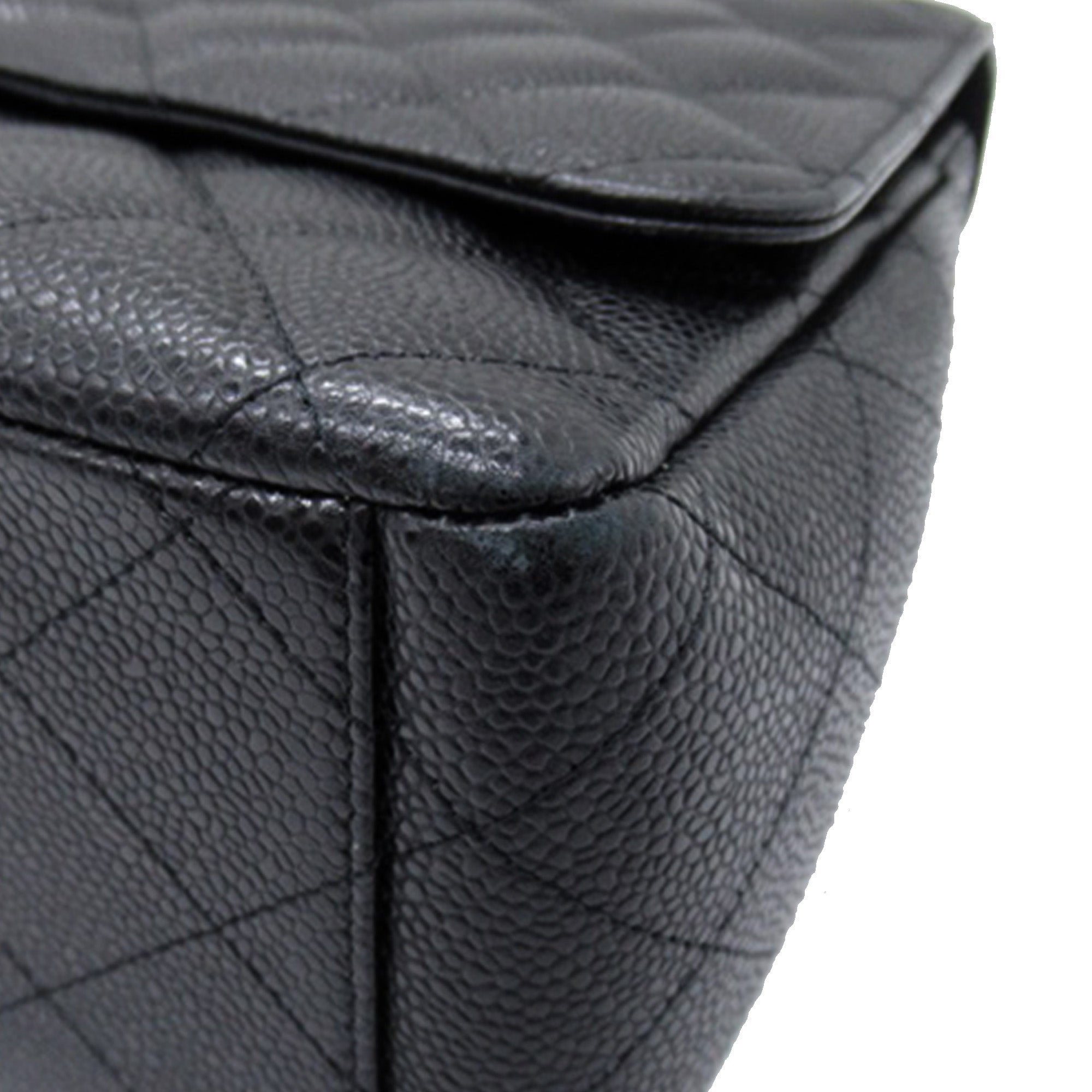 Chanel Maxi Classic Caviar Double Flap - The Boutique