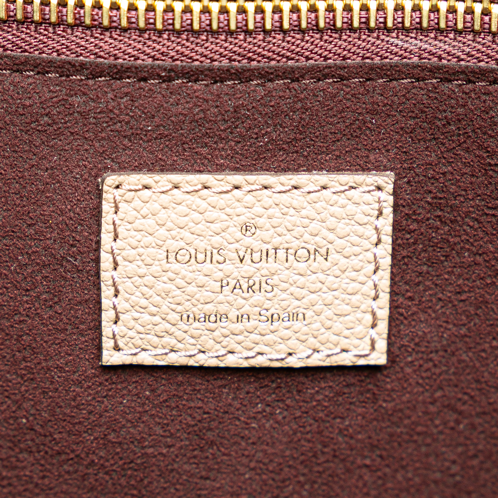 Monogram Giant Empreinte Neverfull MM