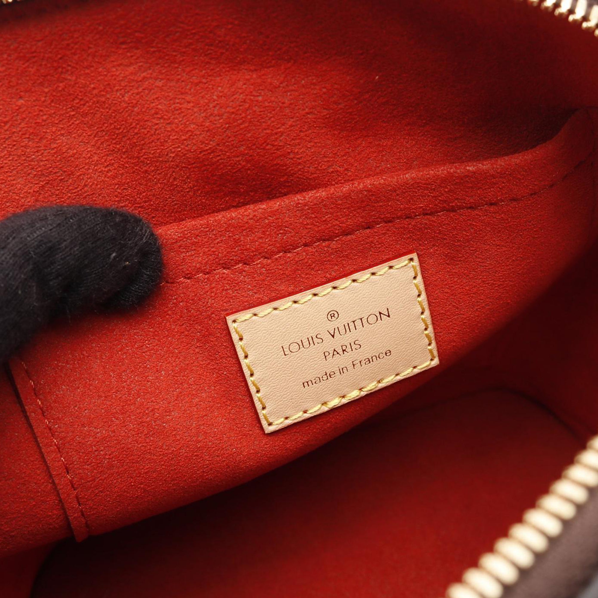 Monogram Alma Backpack