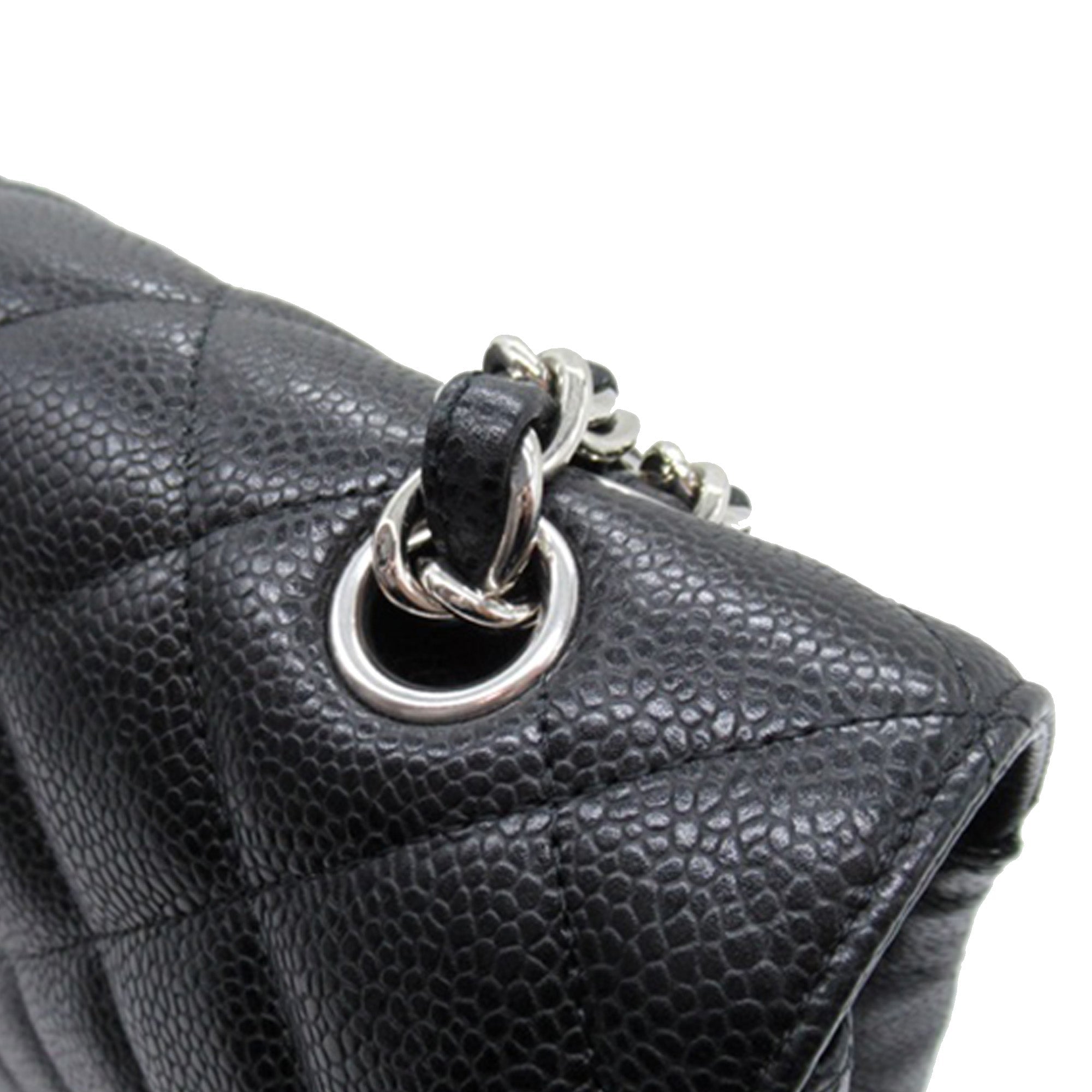 Chanel Maxi Classic Caviar Double Flap - The Boutique