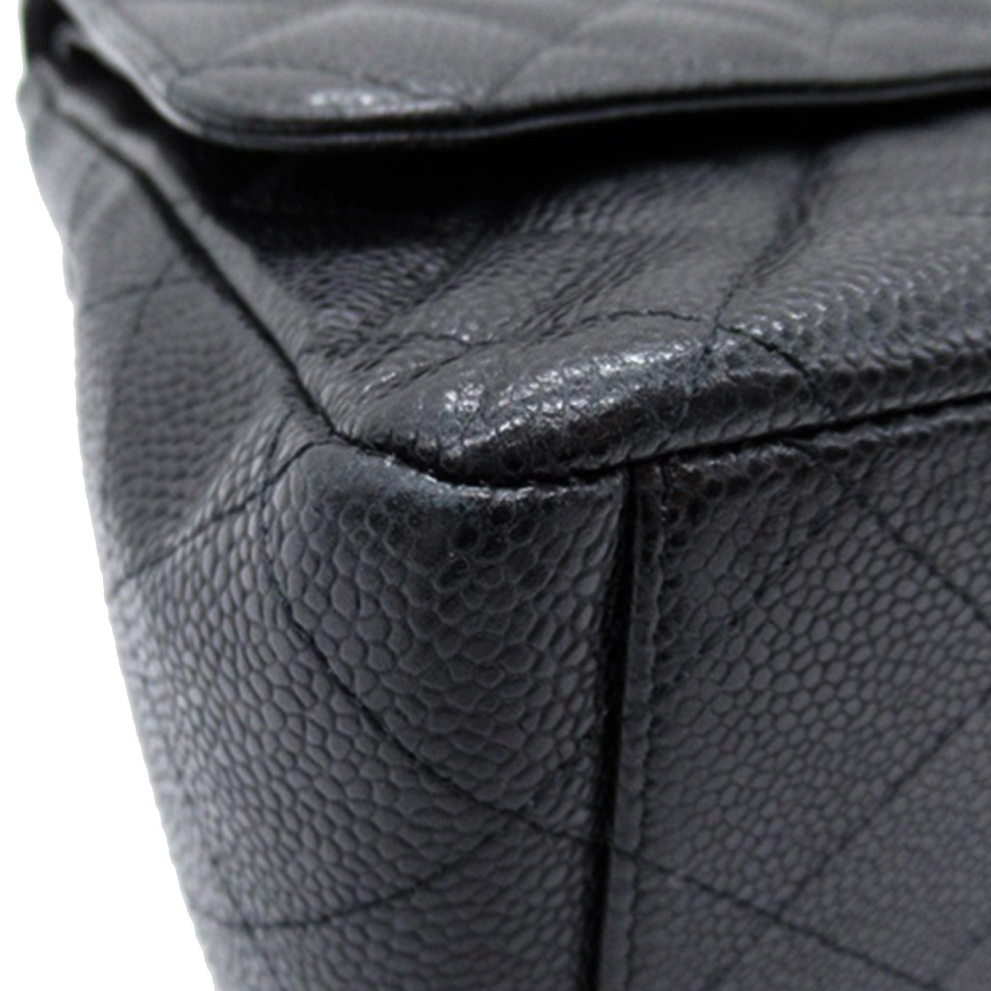 Chanel Maxi Classic Caviar Double Flap - The Boutique